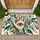 Surreal Blue Eye Held in Ornate Hand with Botanical Vines for Mystical Home Decor Doormat - 1