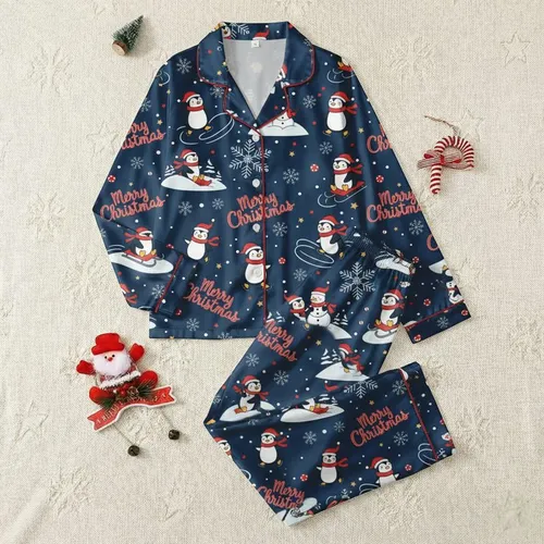 Women's Festive Cartoon Penguin Winter Play Pattern with Red Merry Christmas Text, Navy Blue, White Snowflakes, Golden Stars Satin Pajamas Set