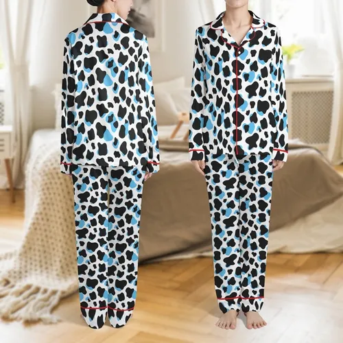 Dynamic Cow Print Design: Bold Black Organic Spots with Layered Vibrant Blue Shapes on White Satin Pajamas Set