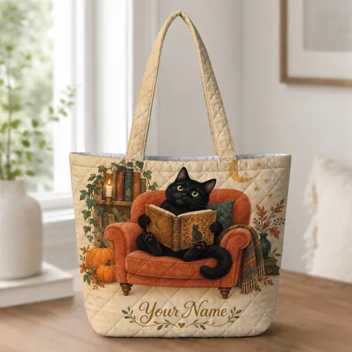 Black Cat Reading in a Cozy Halloween Library for Book Lovers and Cat Fans Quilted Tote Bag