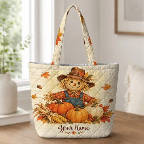 A friendly scarecrow with pumpkins Corn And Autumn Leaves Scarecrow Pumpkin Harvest for Cozy Quilted Tote Bag